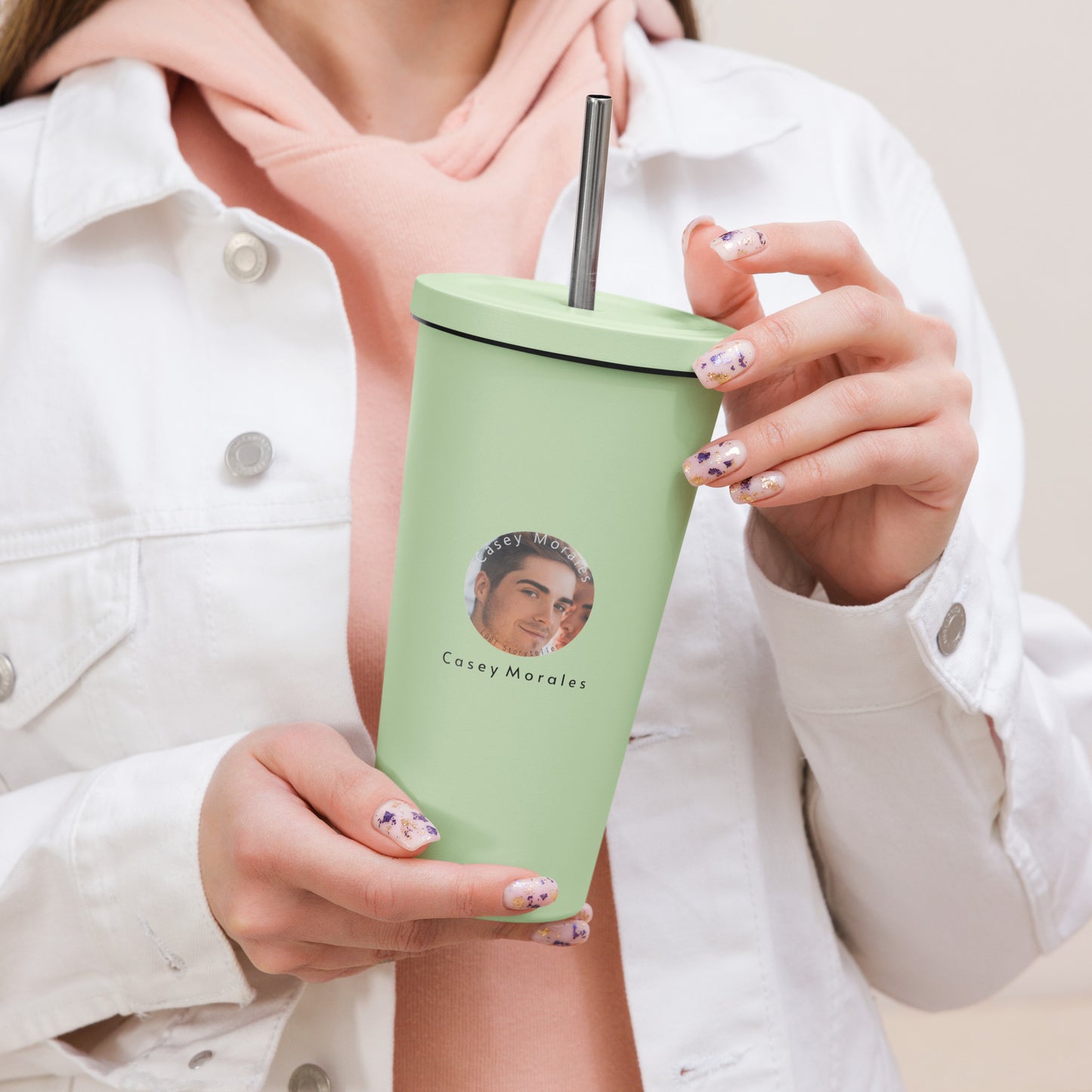 Insulated tumbler with a straw: Casey Morales Brand