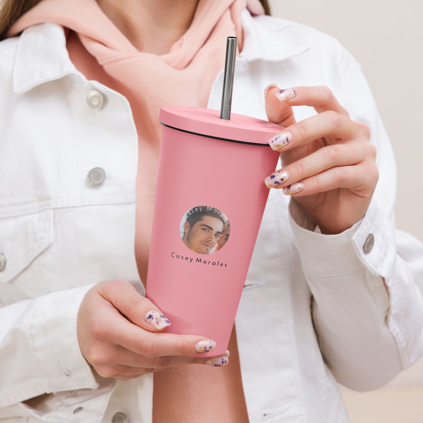 Insulated tumbler with a straw: Casey Morales Brand